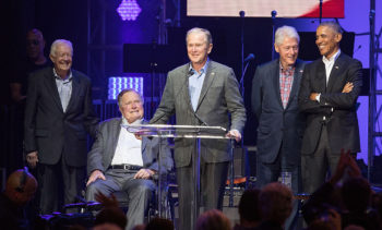Former United States Presidents Jimmy Carter, George H.W. Bush, George W. Bush, Bill Clinton, and Barack Obama address the audience during the 'Deep from the Heart: The One America Appeal Concert' at Reed Arena on the campus of Texas A