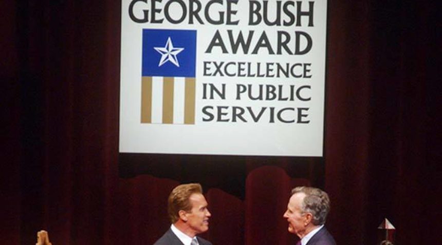 President Bush greets Arnold Schwarzenegger prior to an event at Texas A&M. (Texas A&M Marketing & Communications)