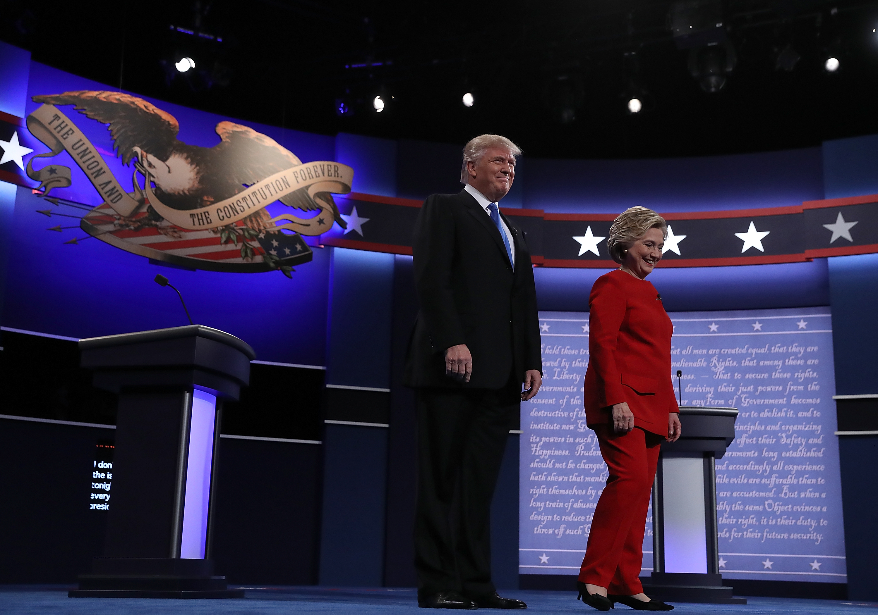 HEMPSTEAD, NY - SEPTEMBER 26: Democratic presidential nominee Hillary (R) and Republican presidential nominee Donald Trump (L) appear on stage before the start of the first presidential debate at Hofstra University on September 26, 2016 in Hempstead, New York. Tonight is the first of four debates for the 2016 election - three presidential and one vice presidential. (Photo by Justin Sullivan/Getty Images)