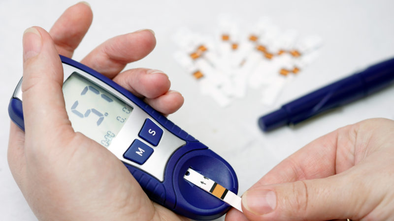 Image Of Person Checking Diabetes