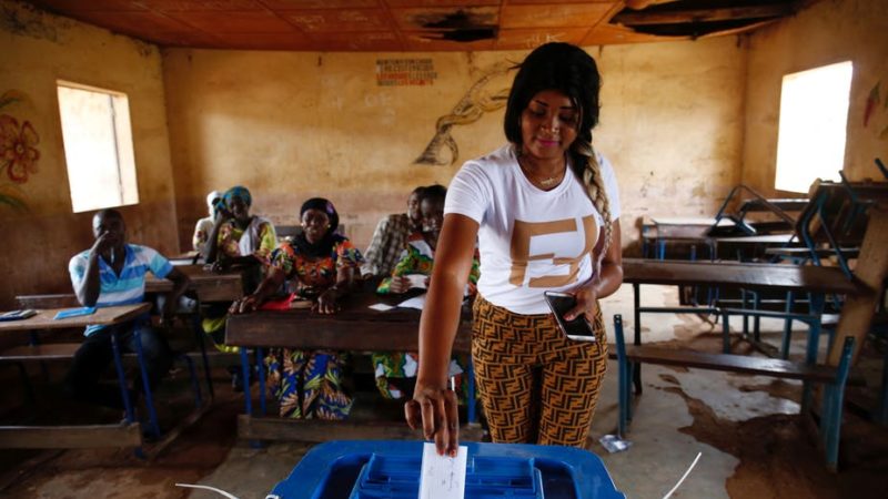 A woman casts her ballot at a polling station during a runoff presidential election in Bamako, Mali on Aug. 12, 2018.