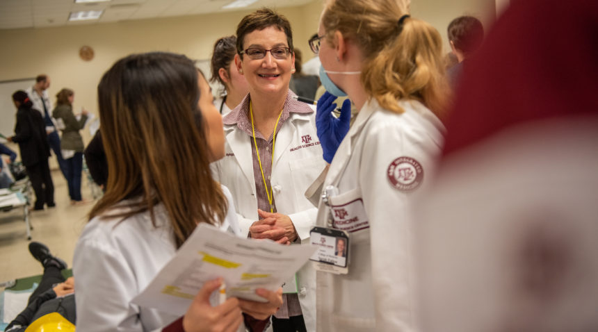 Students speak with Carrie L. Byington ’85, MD, vice chancellor for health services at The Texas A&M University System, senior vice president of the Health Science Center and dean of the College of Medicine at Disaster Day.