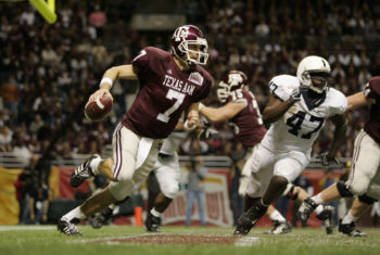 SAN ANTONIO - DECEMBER 29: Quarterback Stephen McGee #7 of the Texas A&M Aggies runs the ball out of the endzone with left end Josh Gaines #47 of the Penn State Nittany Lions in pursuit during the Valero Alamo Bowl on December 29, 2007 at the Alamodome in San Antonio, Texas. Penn State won 24-17. (Photo by Brian Bahr/Getty Images)