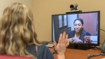 Counselor works with client via telehealth