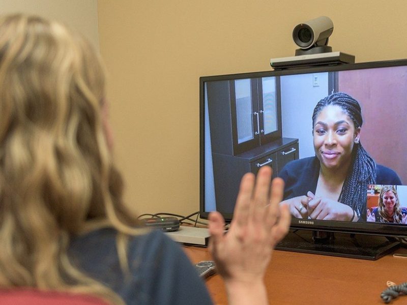 Counselor works with client via telehealth