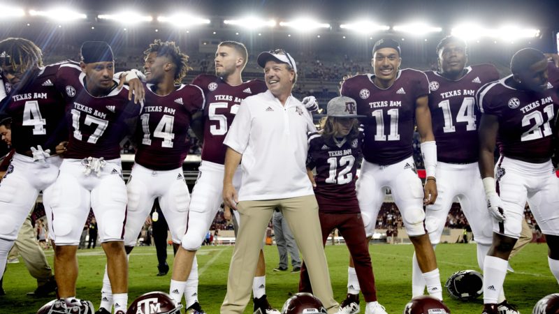Texas A&M head coach Jimbo Fisher celebrates defeating Northwestern State at Kyle Field.