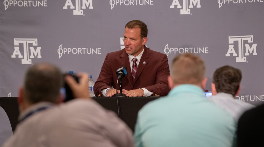 Texas A&M Athletic Director Ross Bjork fields questions from media following a welcome event at Kyle Field.