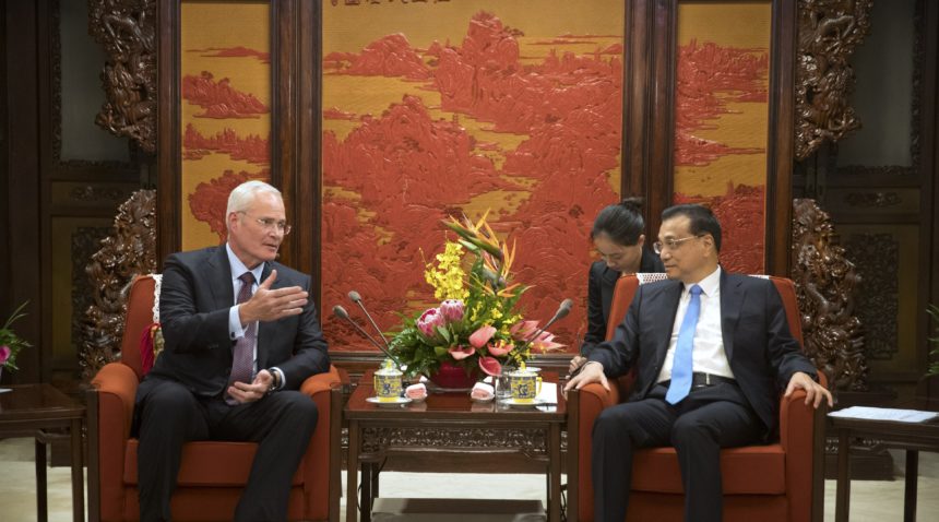 Exxon Mobil Chairman & CEO Darren Woods meets with Chinese Premier Li Keqiang