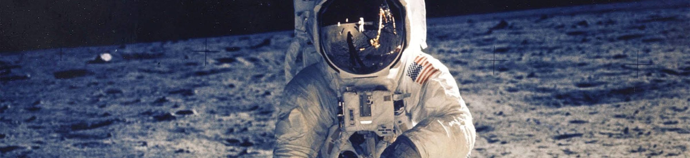stronaut Edwin E. Aldrin Jr., Lunar Module Pilot, Is Photographed Walking Near The Lunar Module During The Apollo 11 Extravehicular Activity.