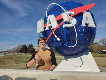 Former student Andrea Lloyd stands at the NASA Langley Research Center.