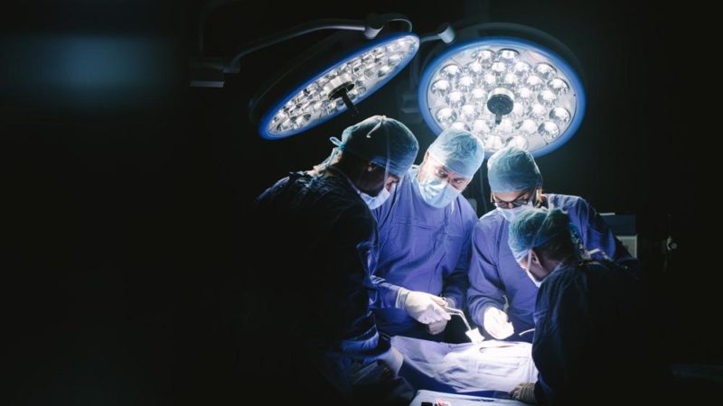 Surgeons at an operating table
