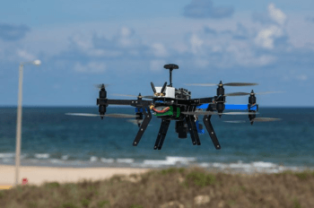 UAVs fly over red tide