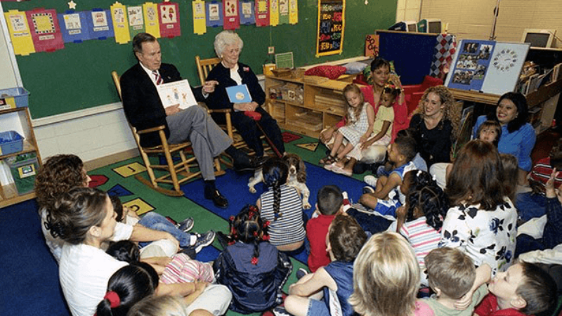 Former President and Mrs. Bush reading