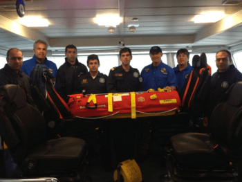 The crew of Cutter 618 (Hellenic Coast Guard) with EMILY.