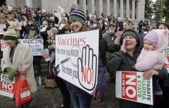 Anti-vaccine protesters at a rally.
