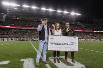 (from left:) LSU Student Government Presidential Press Secretary Jayce Genco, Texas A&M Student Body President Hannah Wimberly and Texas A&M Executive Vice President Dan Rosenfield