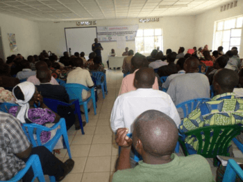 Community members meet with members of Conflict & Development and The Congo Peace Center to declare their commitment to peace and stability in Congo.