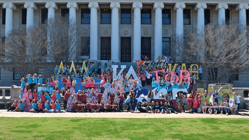 Texas A&M sororities pose before the Jack K. Williams building