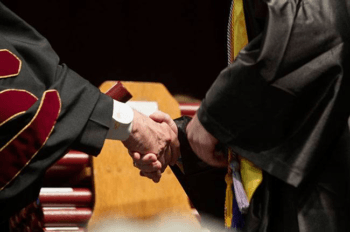 handshake at commencement