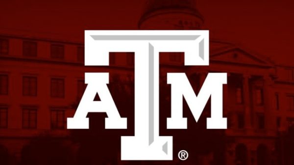 Texas A&M Logo in front of Academic Building