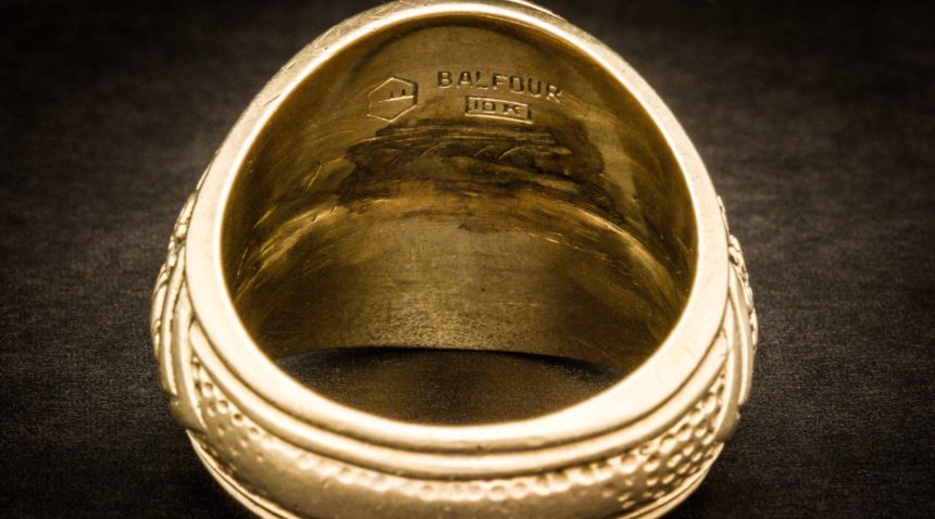 A photo of interior of the '83 Aggie Ring with the owner's name scratched out