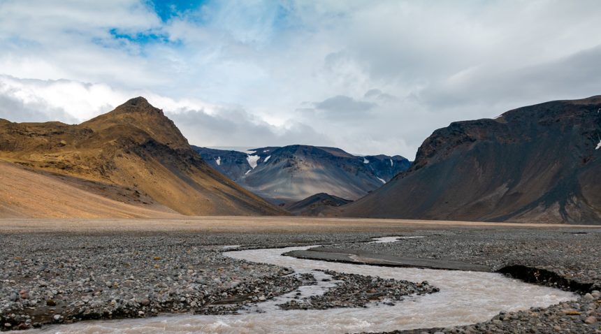 A river runs through Iceland's volcanic highlands.