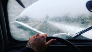 Man Driving A Car During Winter