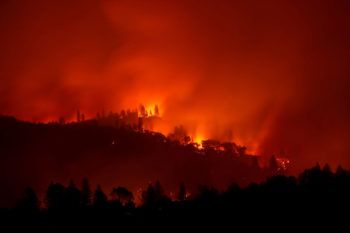 Wildfire spread across a California hillside