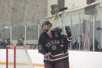 a Texas A&m hockey player skates in the ice
