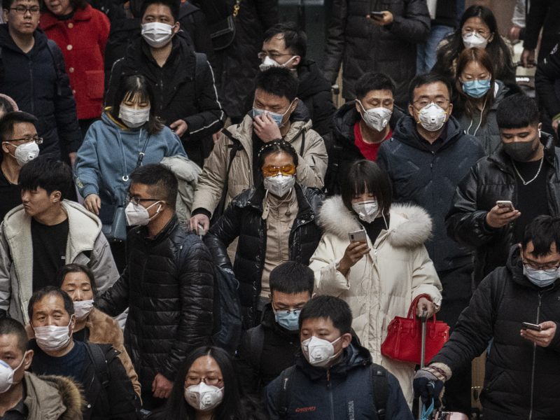 chinese passengers wearing protective masks