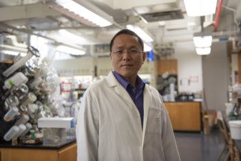 wenshe liu standing in his lab