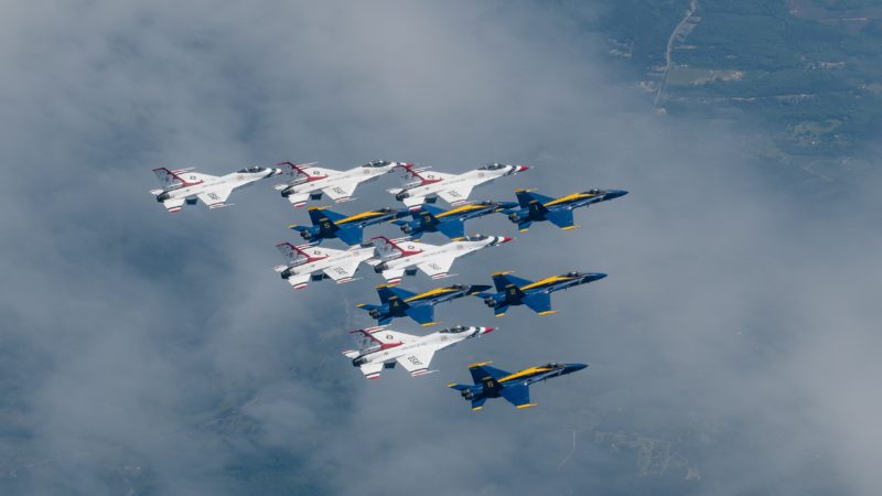view from above of planes flying in formation
