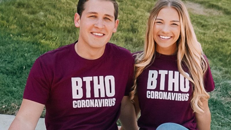 two people sitting down wearing BTHO Coronavirus Shirts