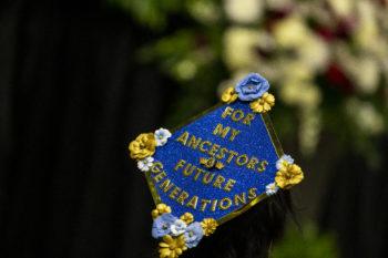 a decorated graduation cap that says "For my ancestors and future generations"