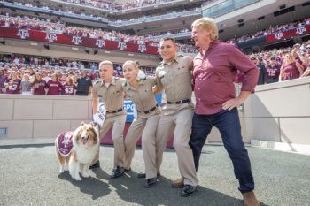 a photo of Reveille IX, Bill Farmer, Colton Ray and two other cadets sawing 'em off at the Texas A&M-Auburn football game on Sept. 21, 2019