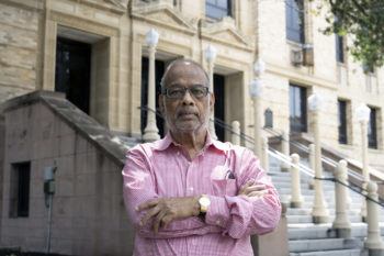 Texas A&M chemist Ganesa Gopalakrishnan stands in front of the Texas A&M Chemistry Building,