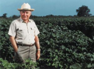 perry adkisson standing in a field