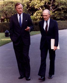 brent scowcroft walking alongside president bush
