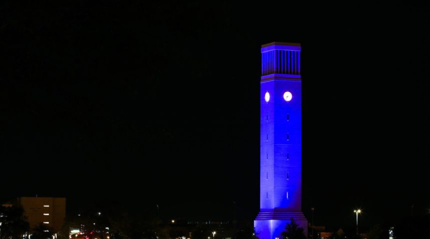 albritton bell tower with blue light
