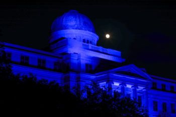 academic building shot at night with blue light