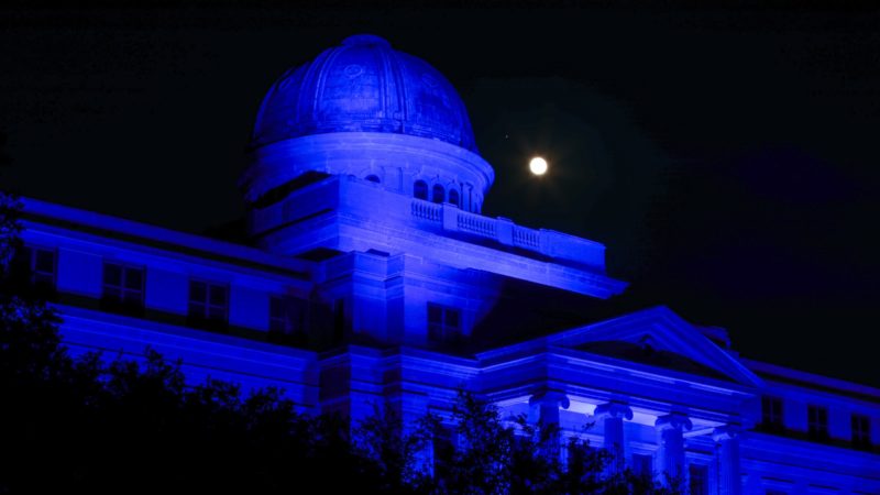 academic building shot at night with blue light