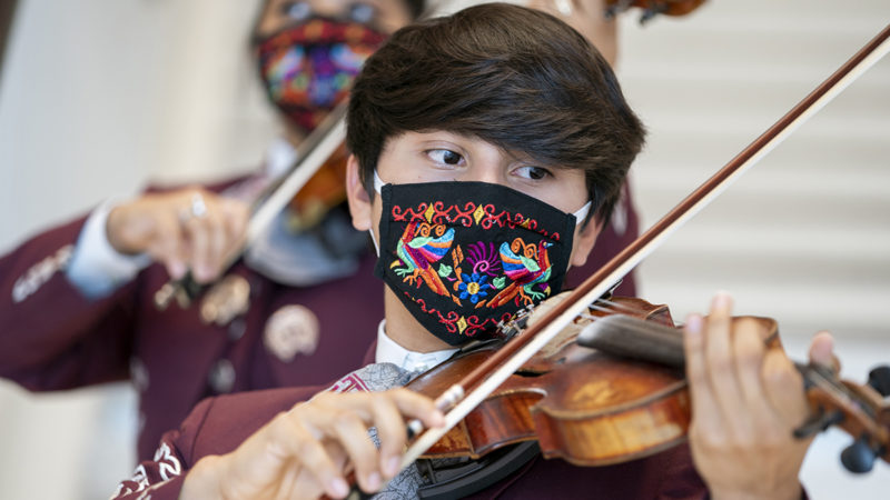 a photo of a violin player from Aggieland Mariachi