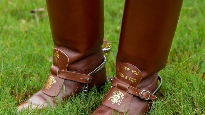 a closeup photo of Jazzlyn Gonzalez's boots that read 