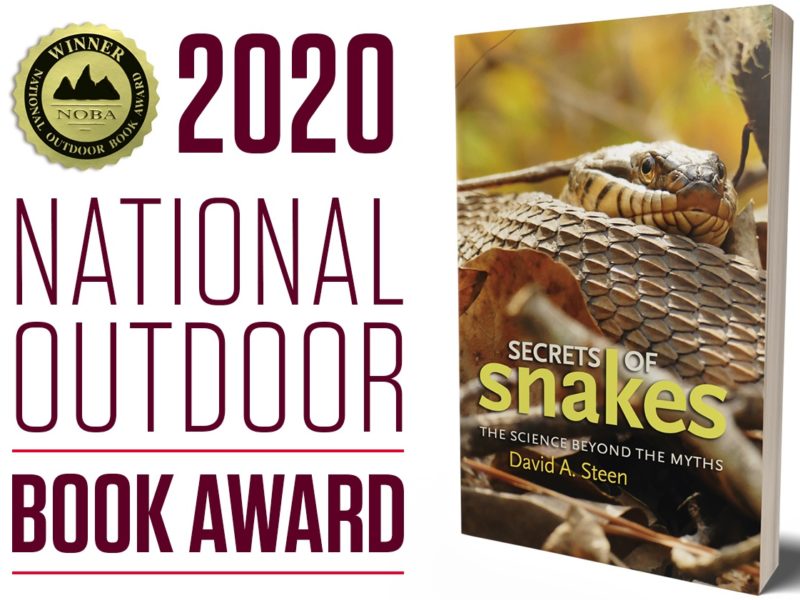 a graphic reading 2020 national outdoor book award and the cover of Secrets of Snakes