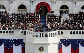 Barack obama stands at the u.s. capitol building giving inaugural address at inauguration