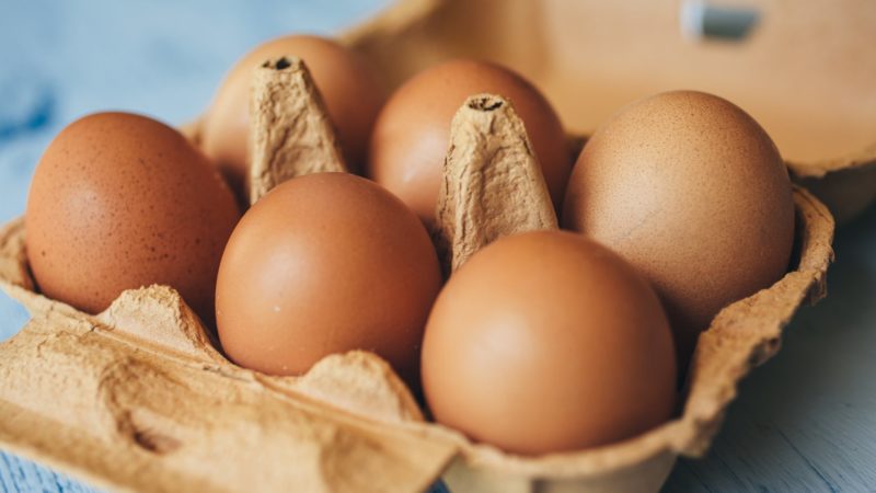 close up of eggs in a carton