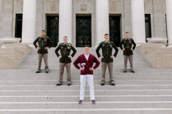 the 2021-22 Yell Leaders posing together on the steps of the Jack K. Williams building