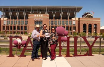 (l-r) Reggie, Shelby and Kathy Lepley at the 2021 Family Weekend Tailgate