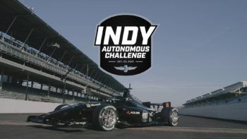 photo of a race car on race track with the indy autonomous challenge logo