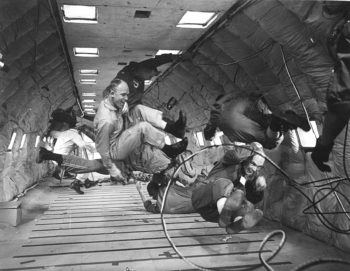 black and white photo of frazier and others in zero gravity